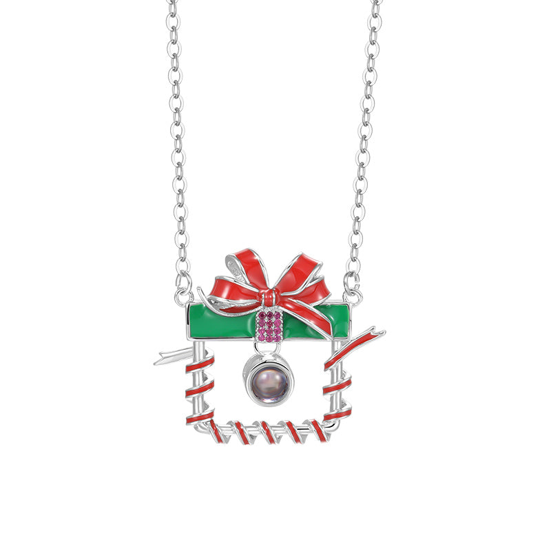 Christmas Projector Stone Necklace Set Says "Merry Christmas" in a Hundred Languages